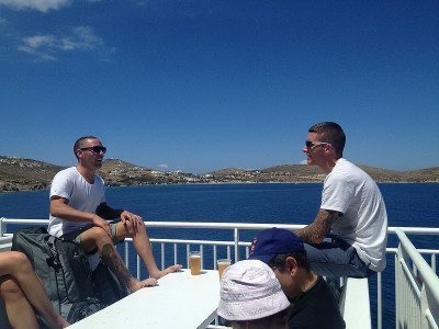 Travel by ferry from Mykonos to Paros to Santorini
