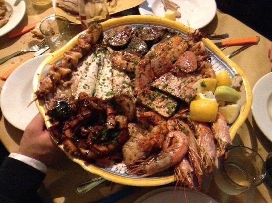 Comer pescado en el Melafumo di Livorno